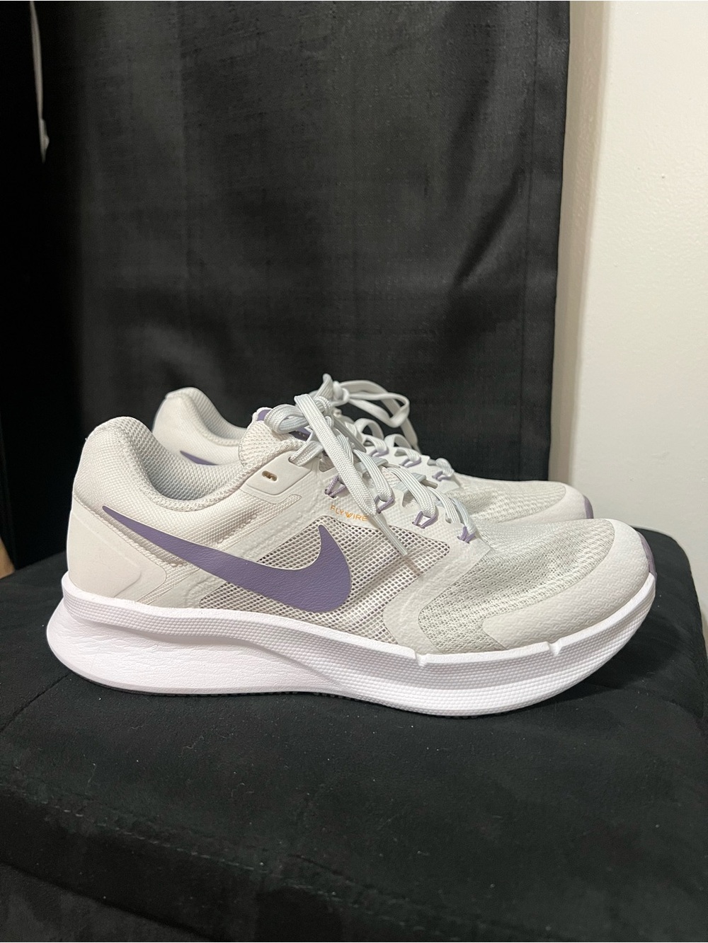 Nike Women’s White Athletic Shoes with Lavender Swoosh